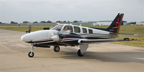 A P-Baron fuselage ready to leave after repairs. . Beechcraft baron tip tanks